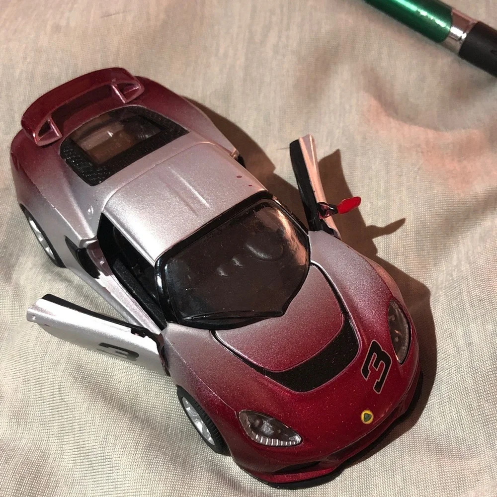 Red and Silver Lotus Exige S pull back action.